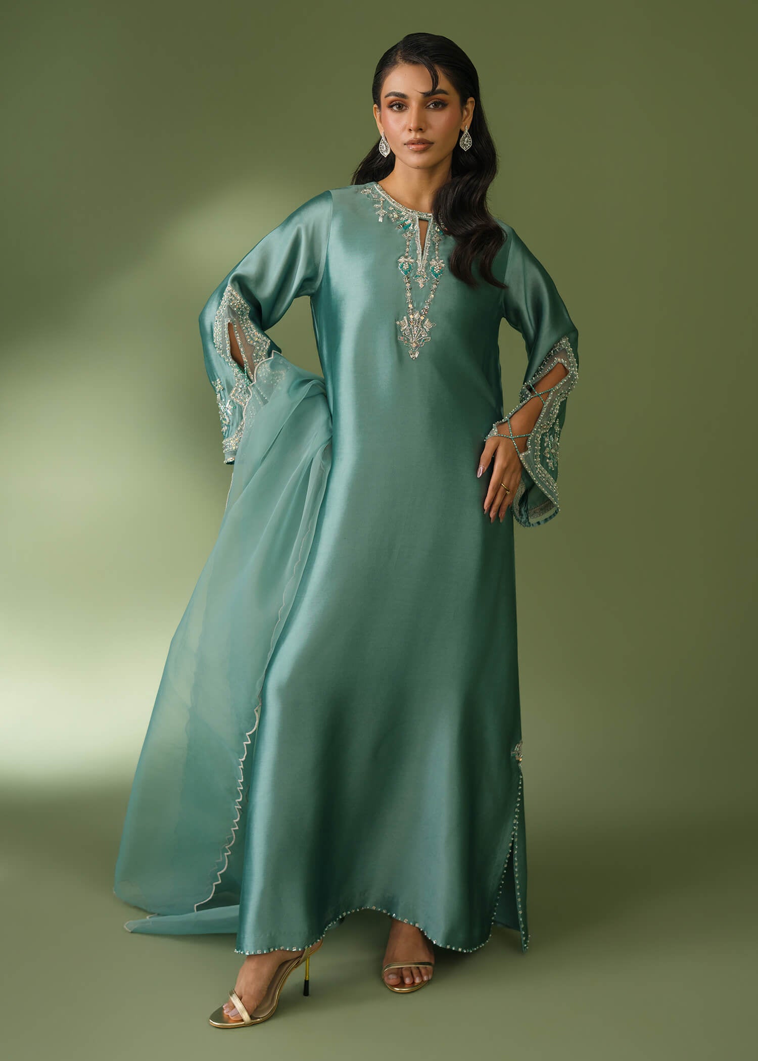 Teal silk suit with floor-length shirt and sequin embroidery