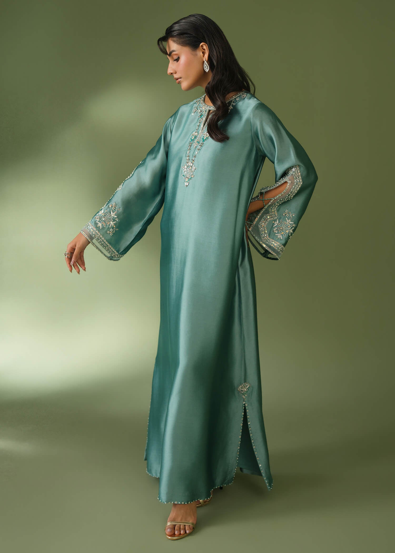 Teal silk suit with floor-length shirt and sequin embroidery