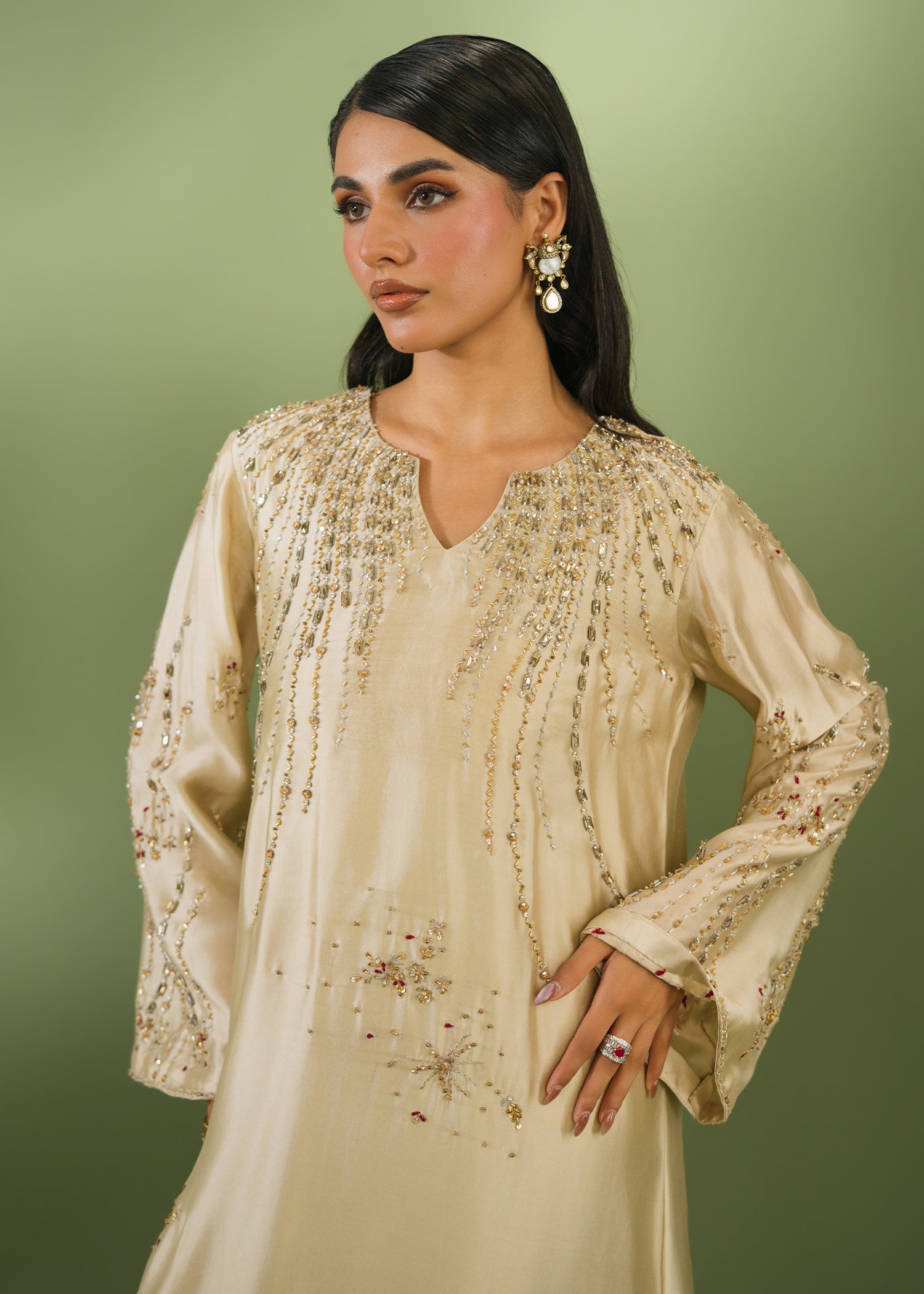 Beige embroidered kurta with floral sequin work and net dupatta