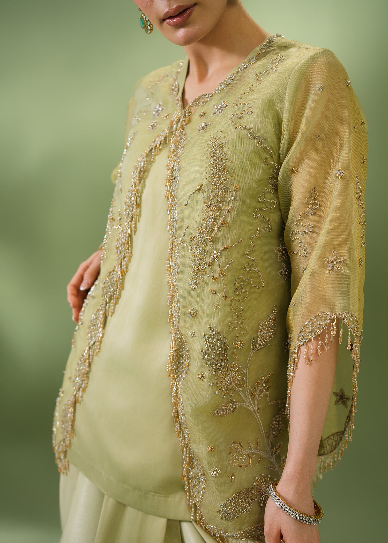 Pistachio green organza jacket with chamuse silk skirt
