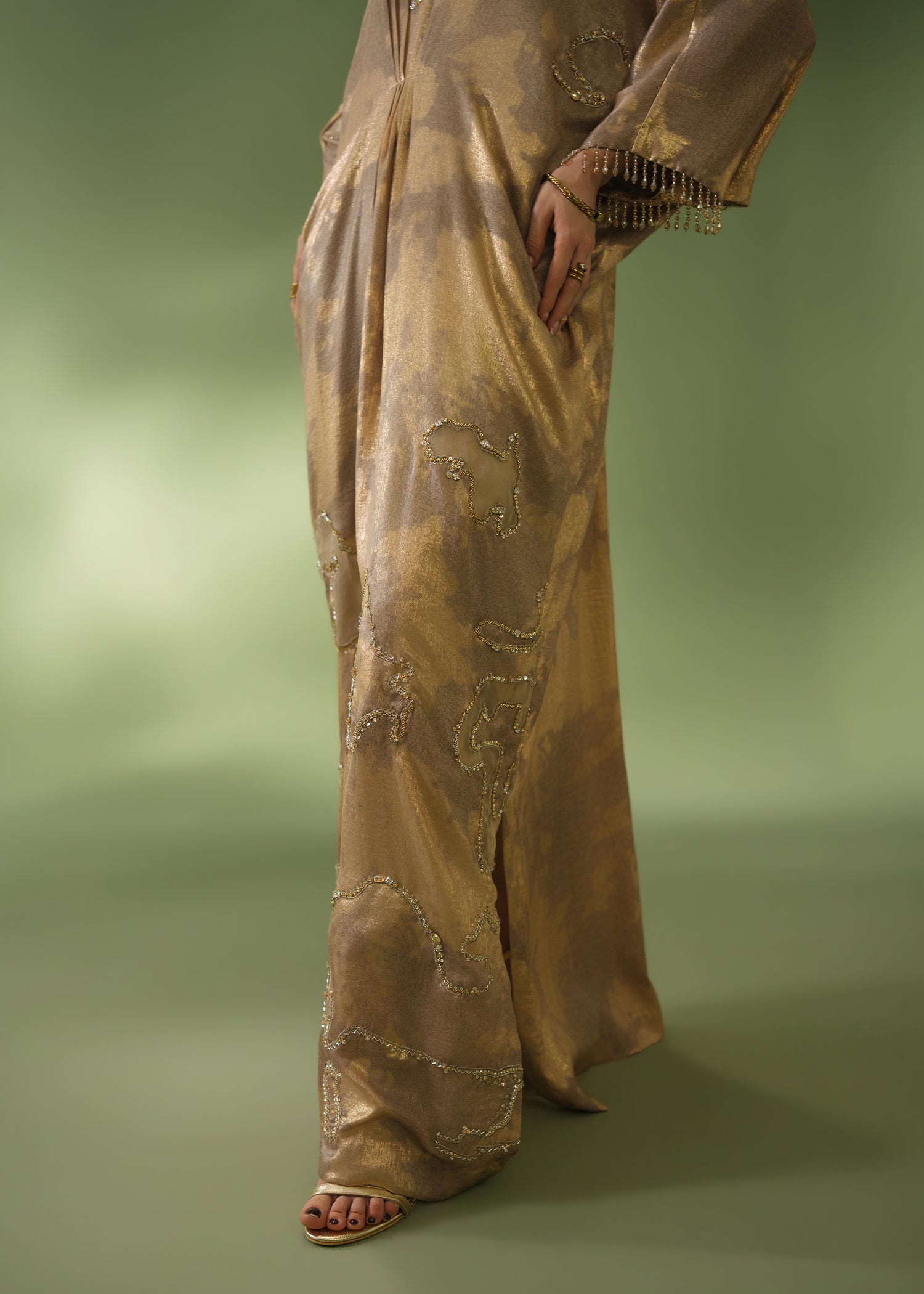 Gold tie-dye kaftan with beaded neckline and sequin hem