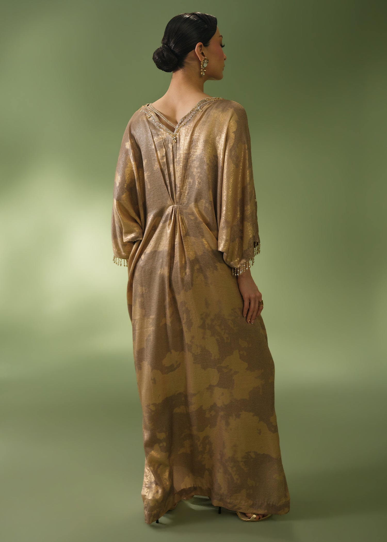 Gold tie-dye kaftan with beaded neckline and sequin hem