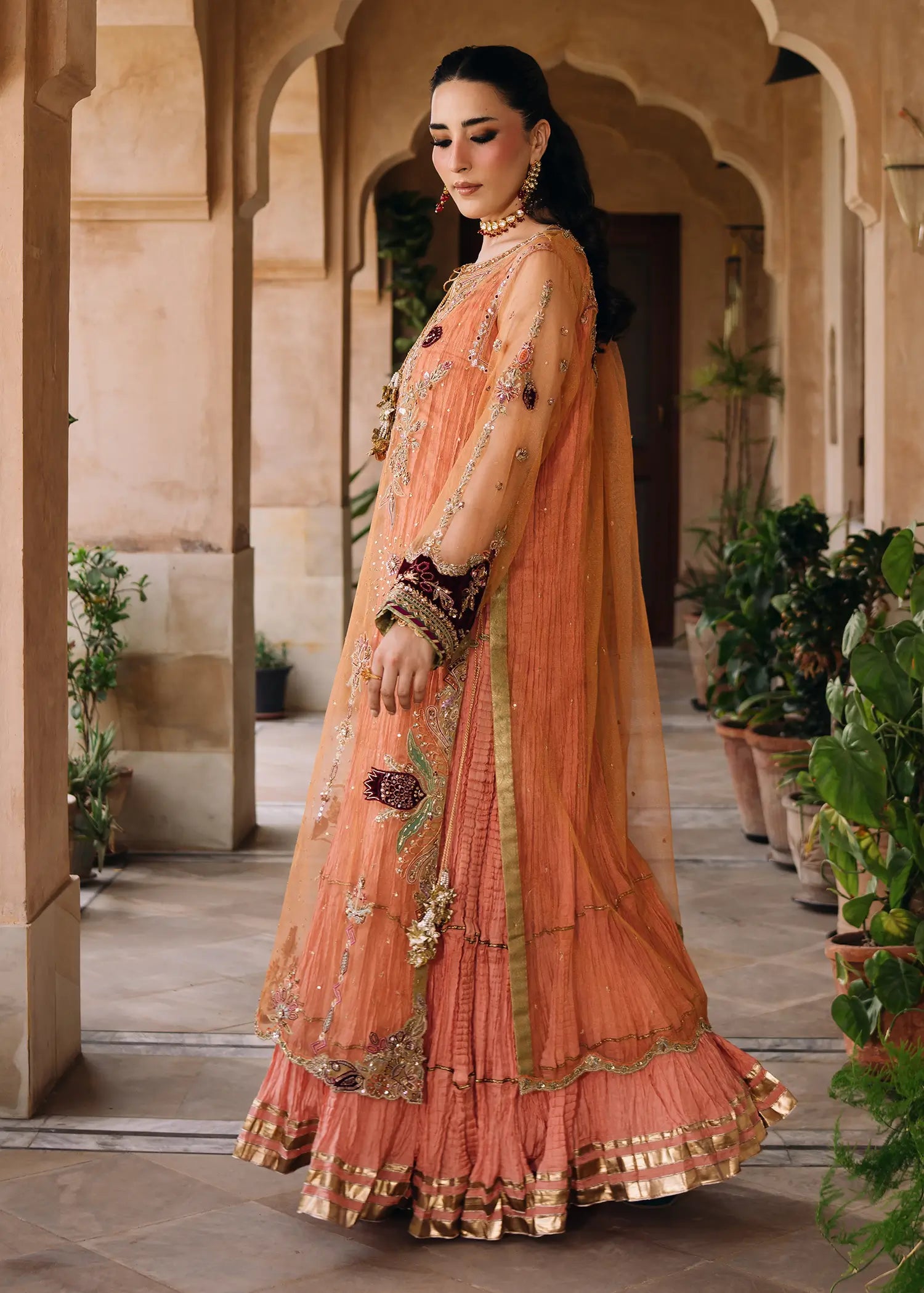 Persian Night peach khaddi net dress with zardozi work
