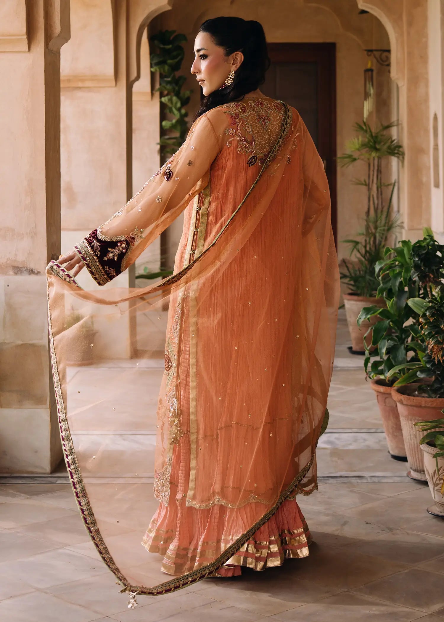 Persian Night peach khaddi net dress with zardozi work