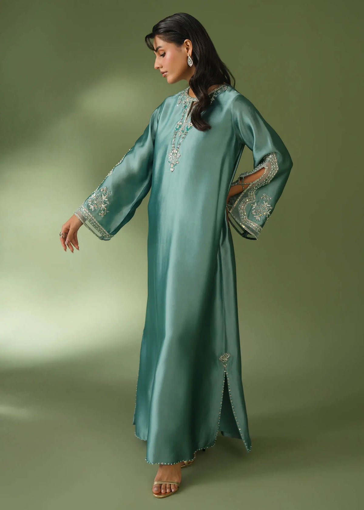 Teal silk suit with floor-length shirt and sequin embroidery
