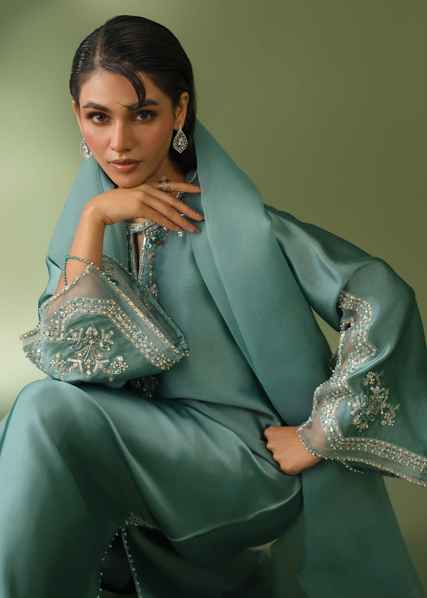 Teal silk suit with floor-length shirt and sequin embroidery
