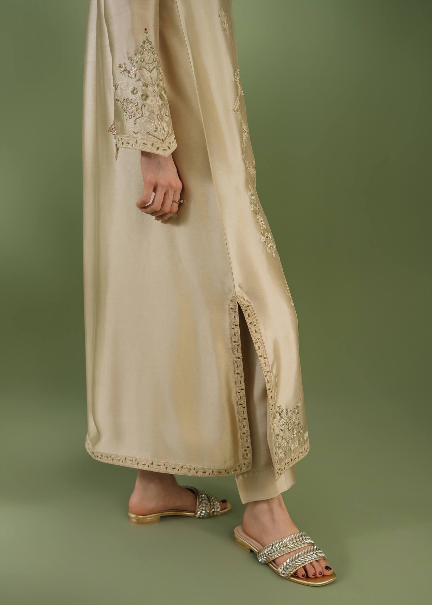 Beige silk 3-piece suit with boat neckline and tassel detail