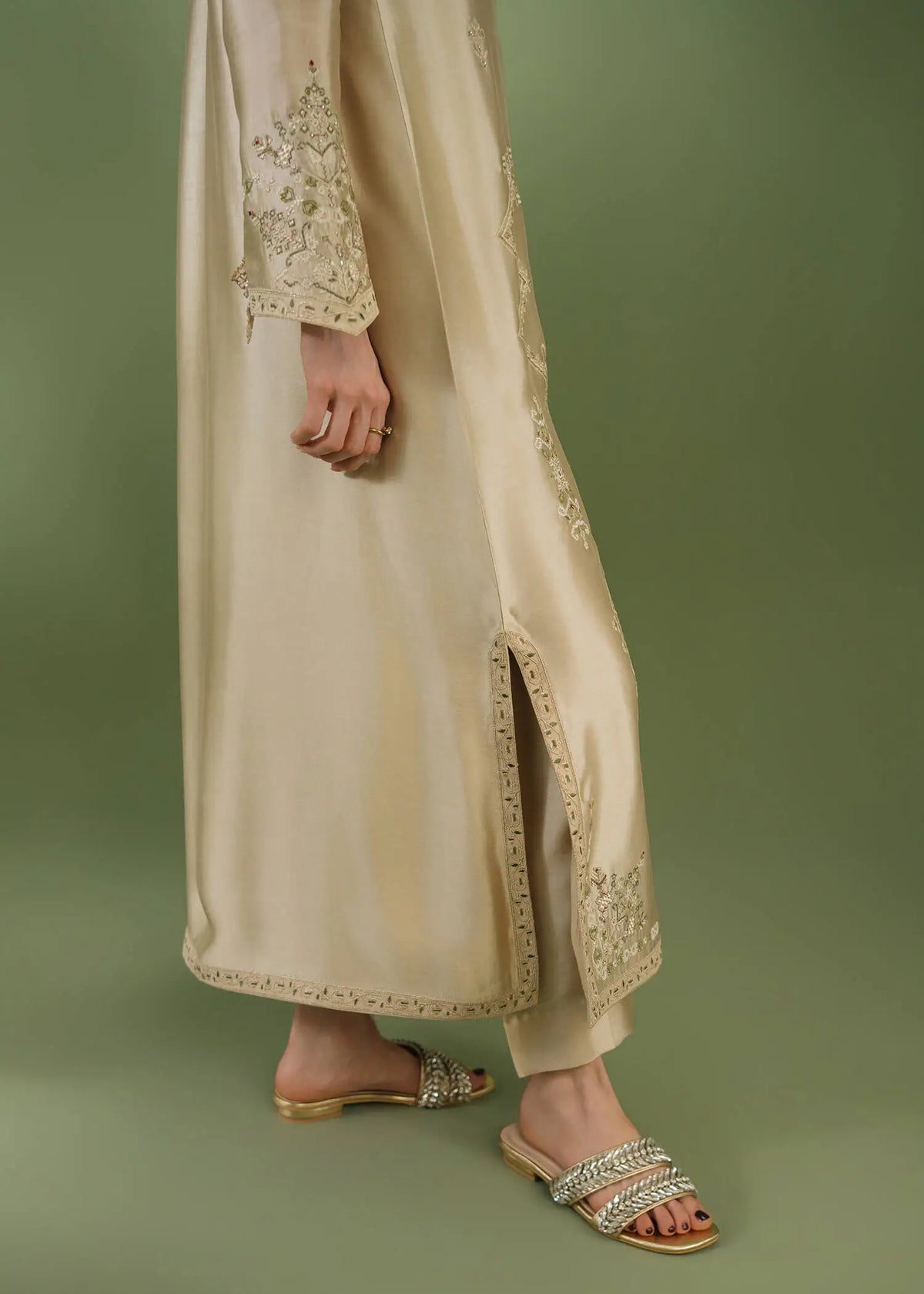 Beige silk 3-piece suit with boat neckline and tassel detail