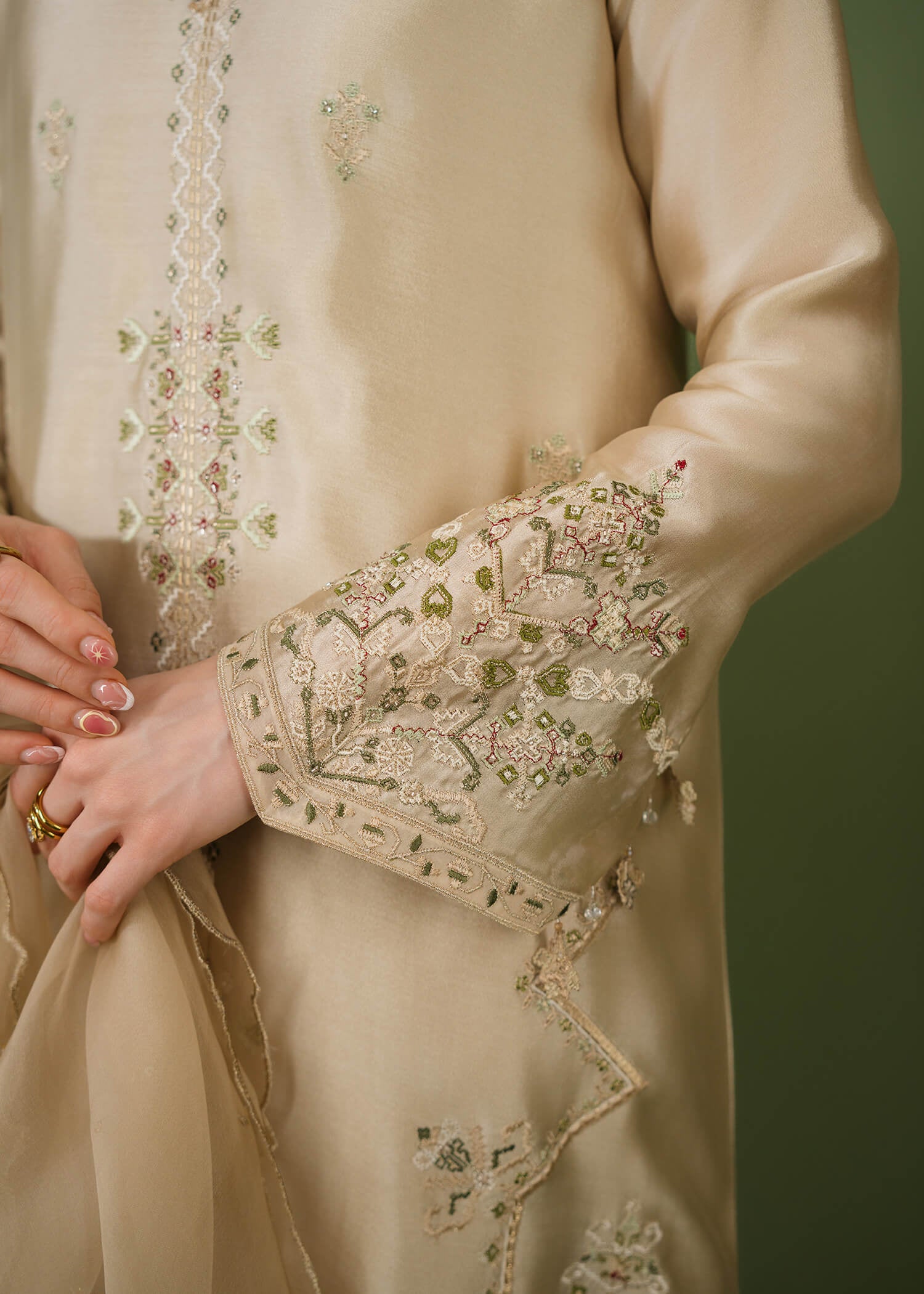 Beige silk 3-piece suit with boat neckline and tassel detail