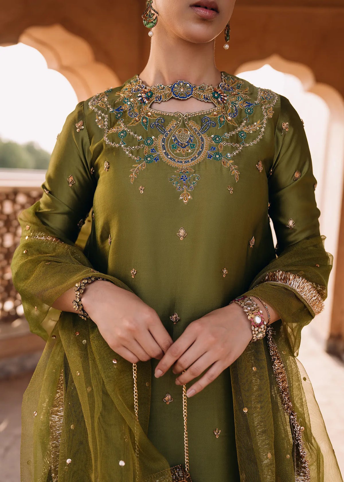 JEEM Olive Tree peacock green sheesha silk suit with zardozi resham work
