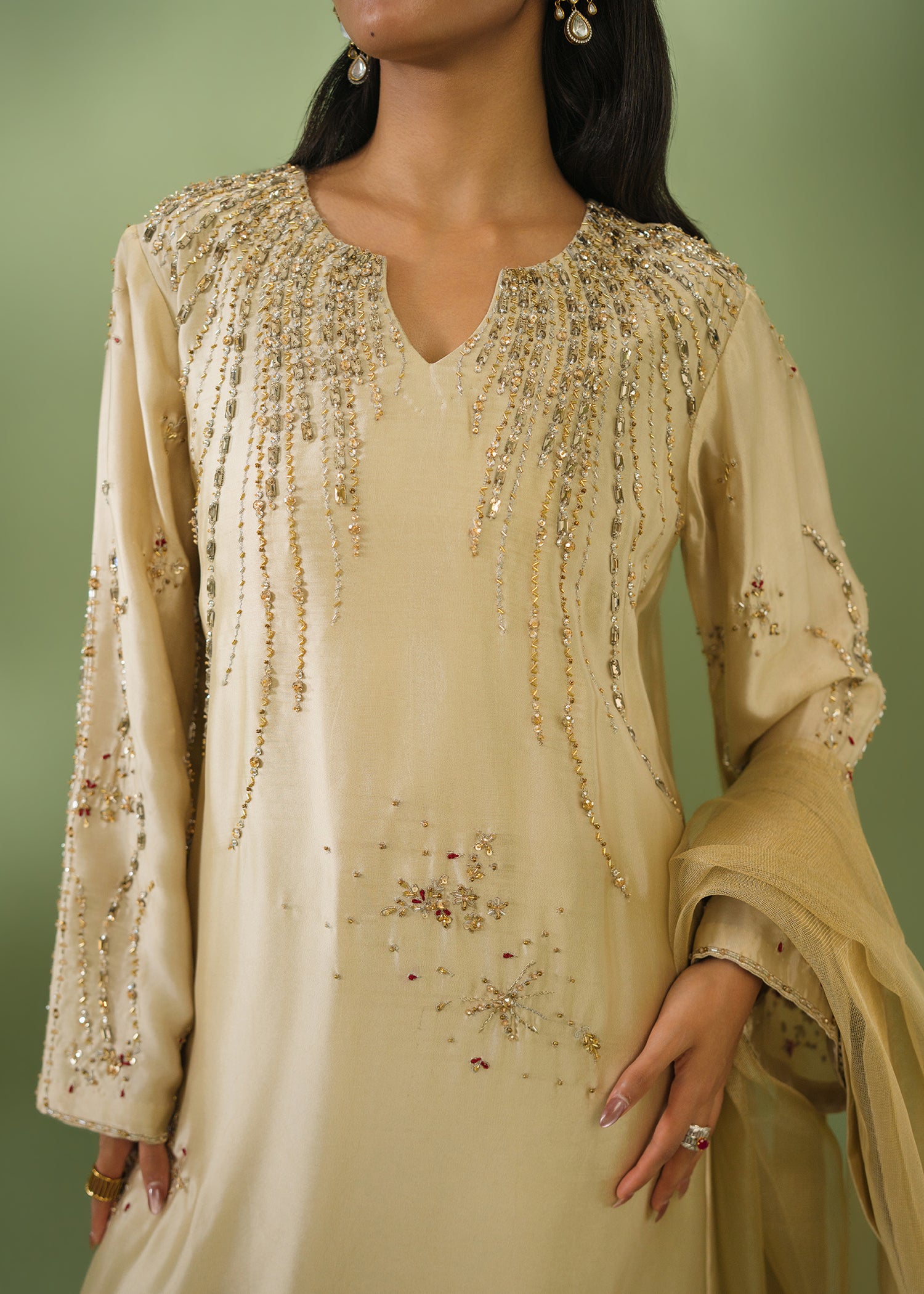 Beige embroidered kurta with floral sequin work and net dupatta