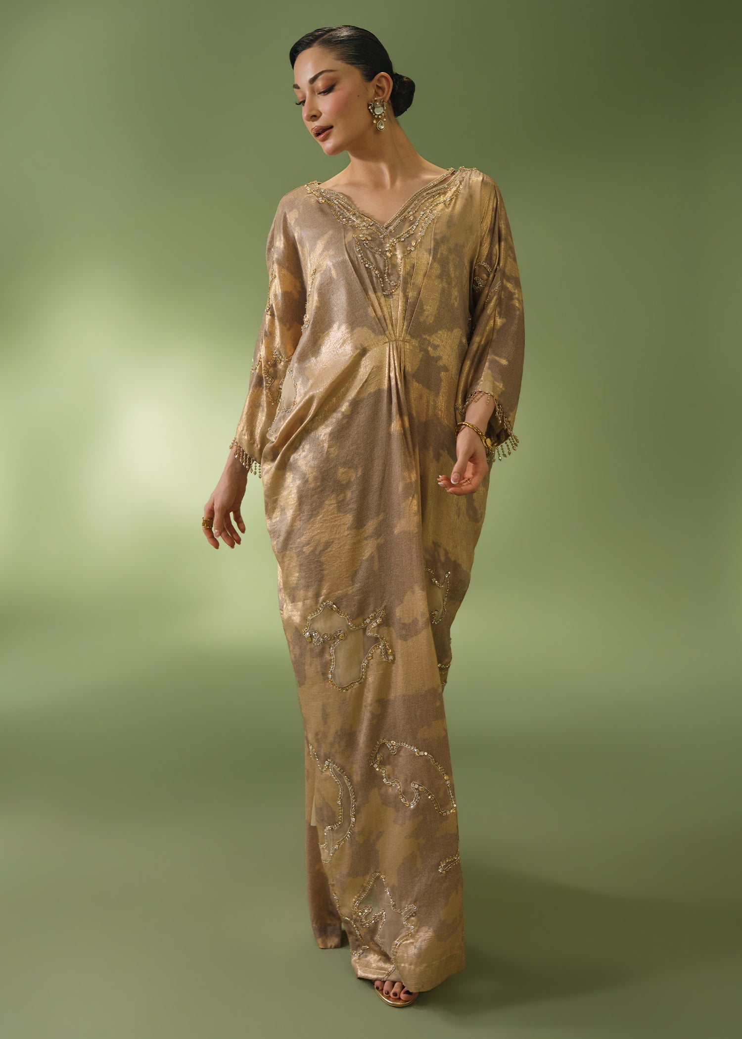 Gold tie-dye kaftan with beaded neckline and sequin hem