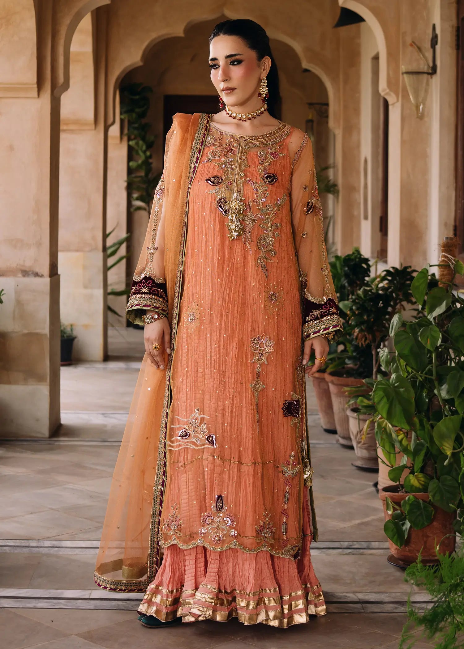 Persian Night peach khaddi net dress with zardozi work