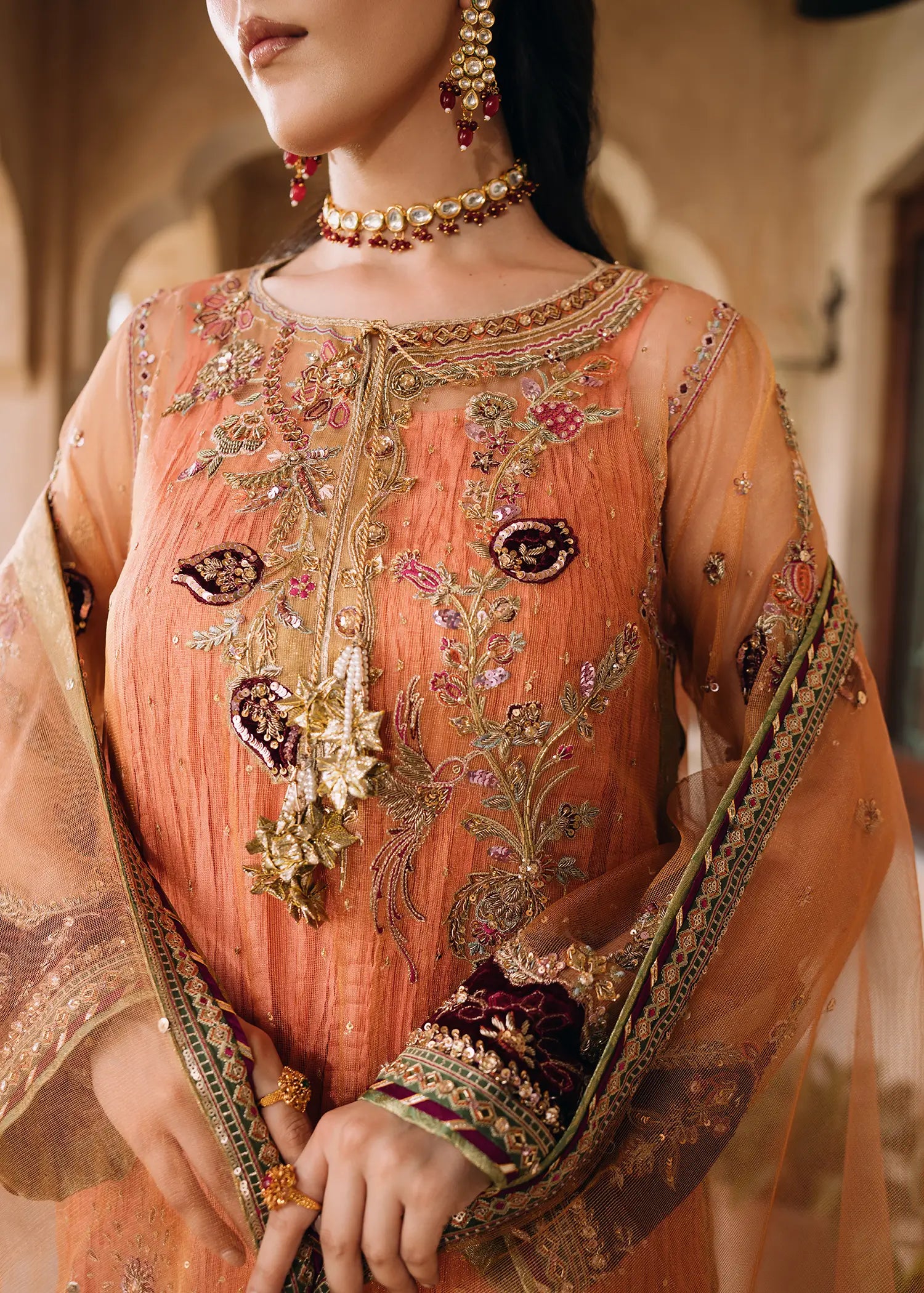 Persian Night peach khaddi net dress with zardozi work