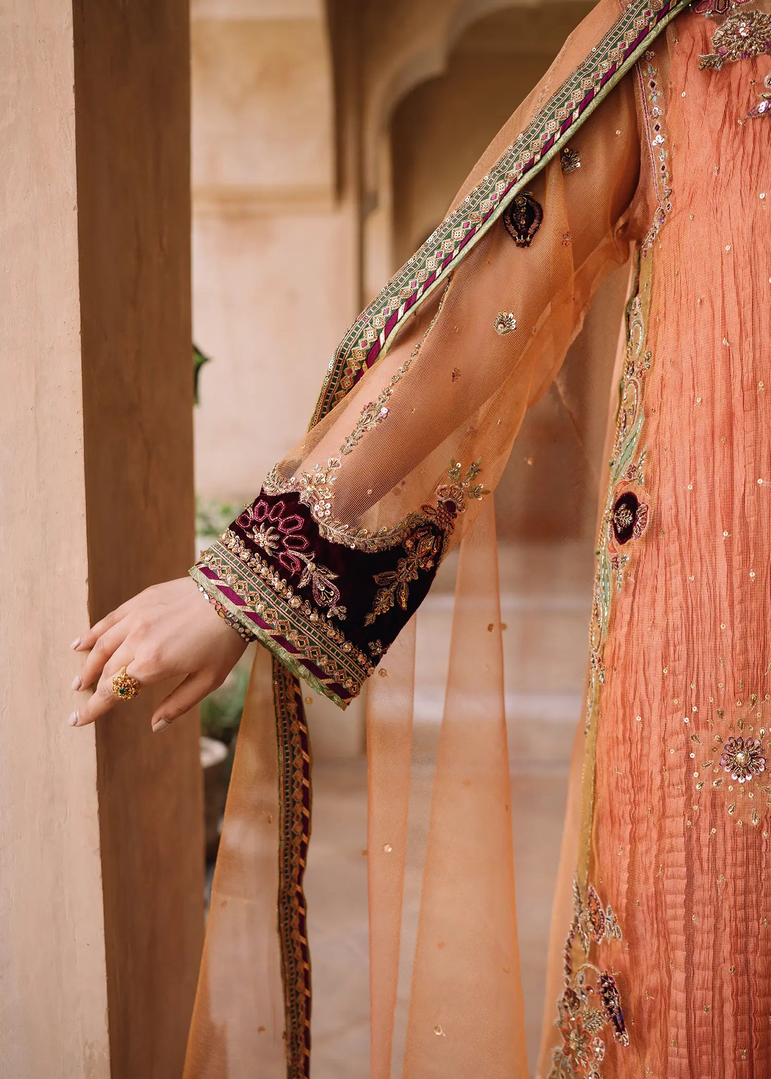 Persian Night peach khaddi net dress with zardozi work